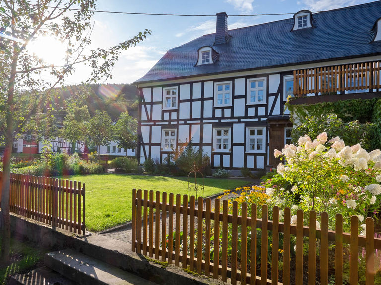 Half-timbered house and farm garden in Lenne in the Sauerland